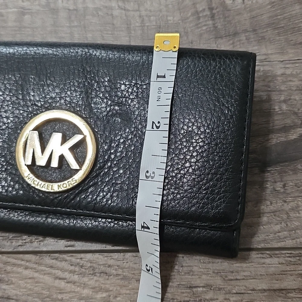 Michael Kors Fulton Large Flap Continental Wallet in black pebbled leather